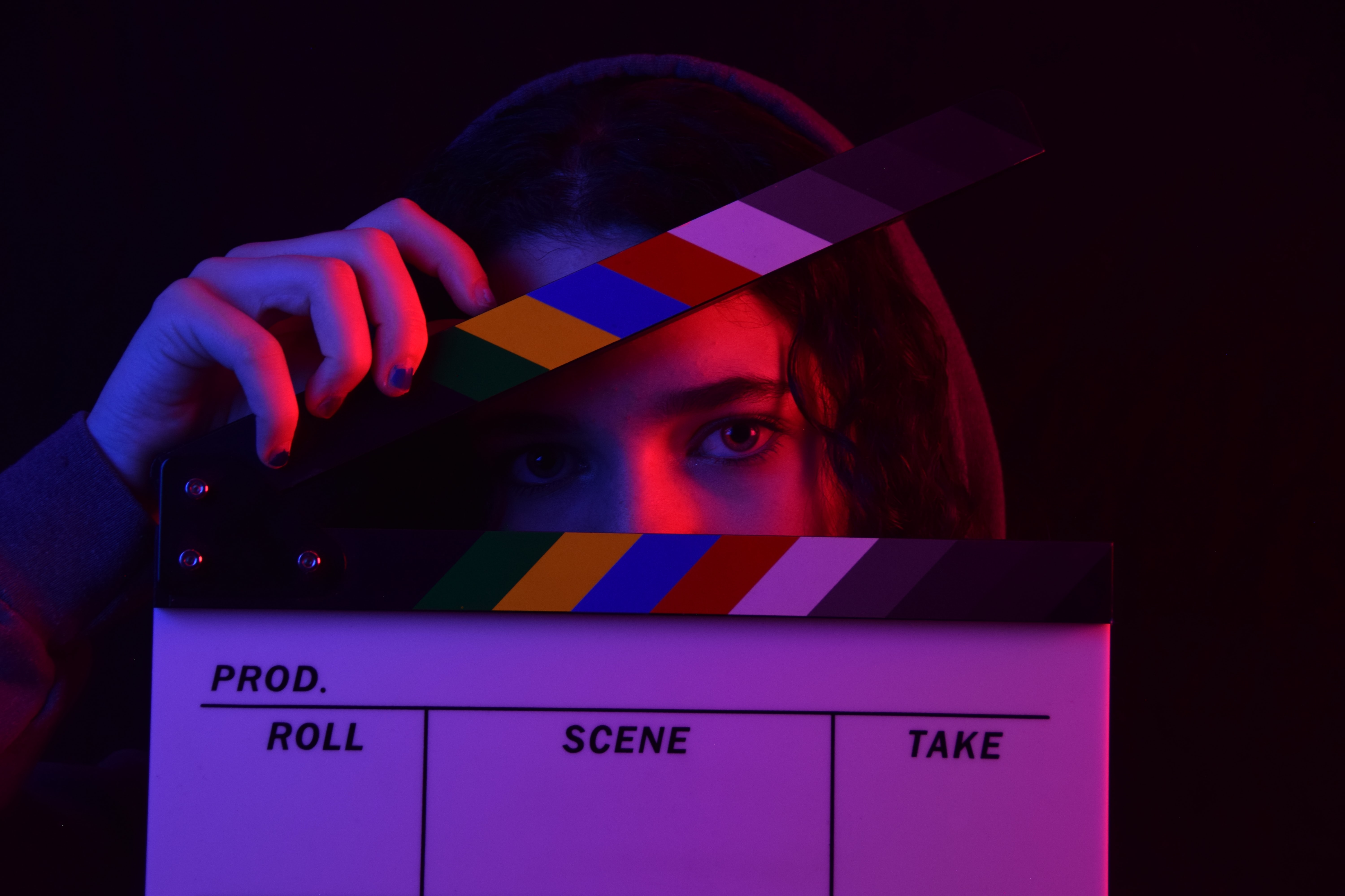 Person looking through a clapboard